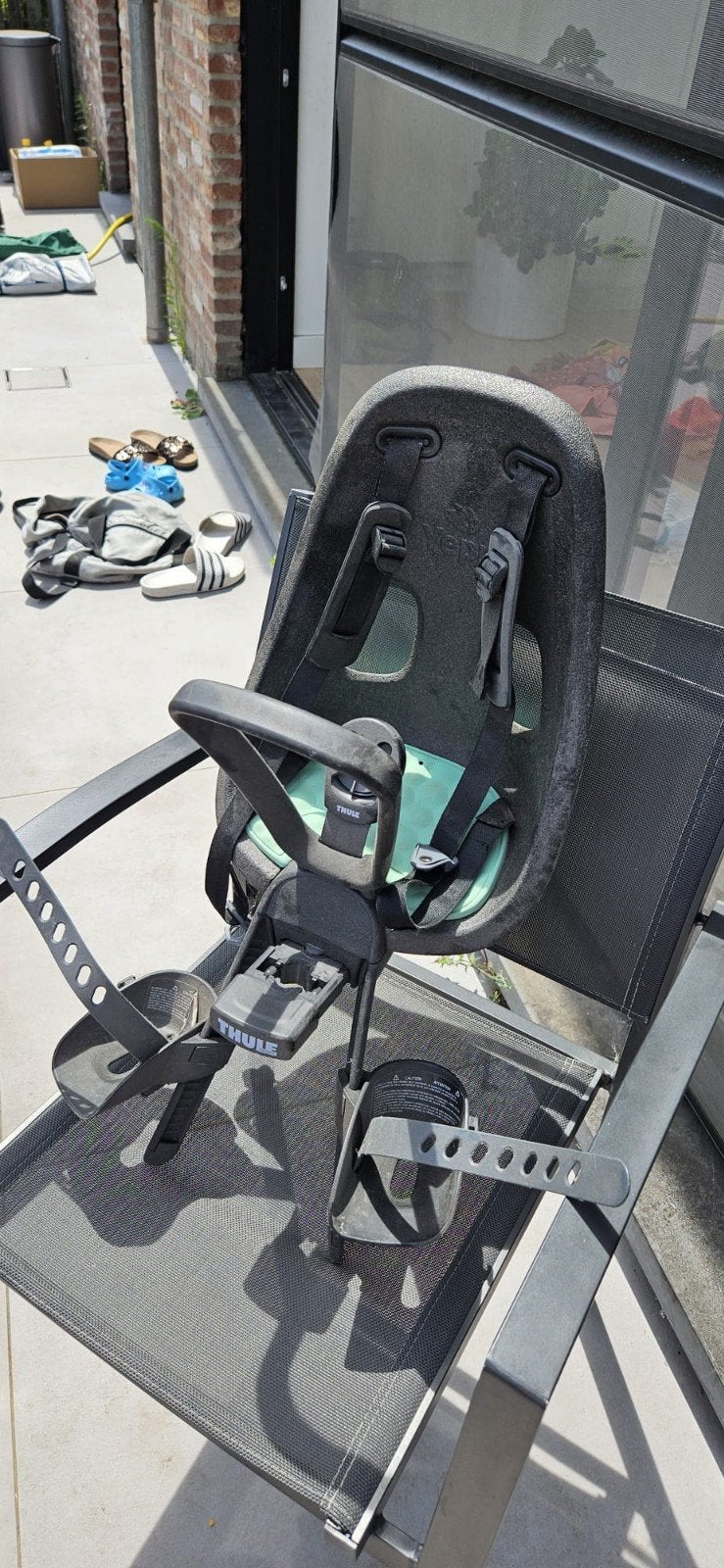 Fietsstoeltje Thule, Ophalen