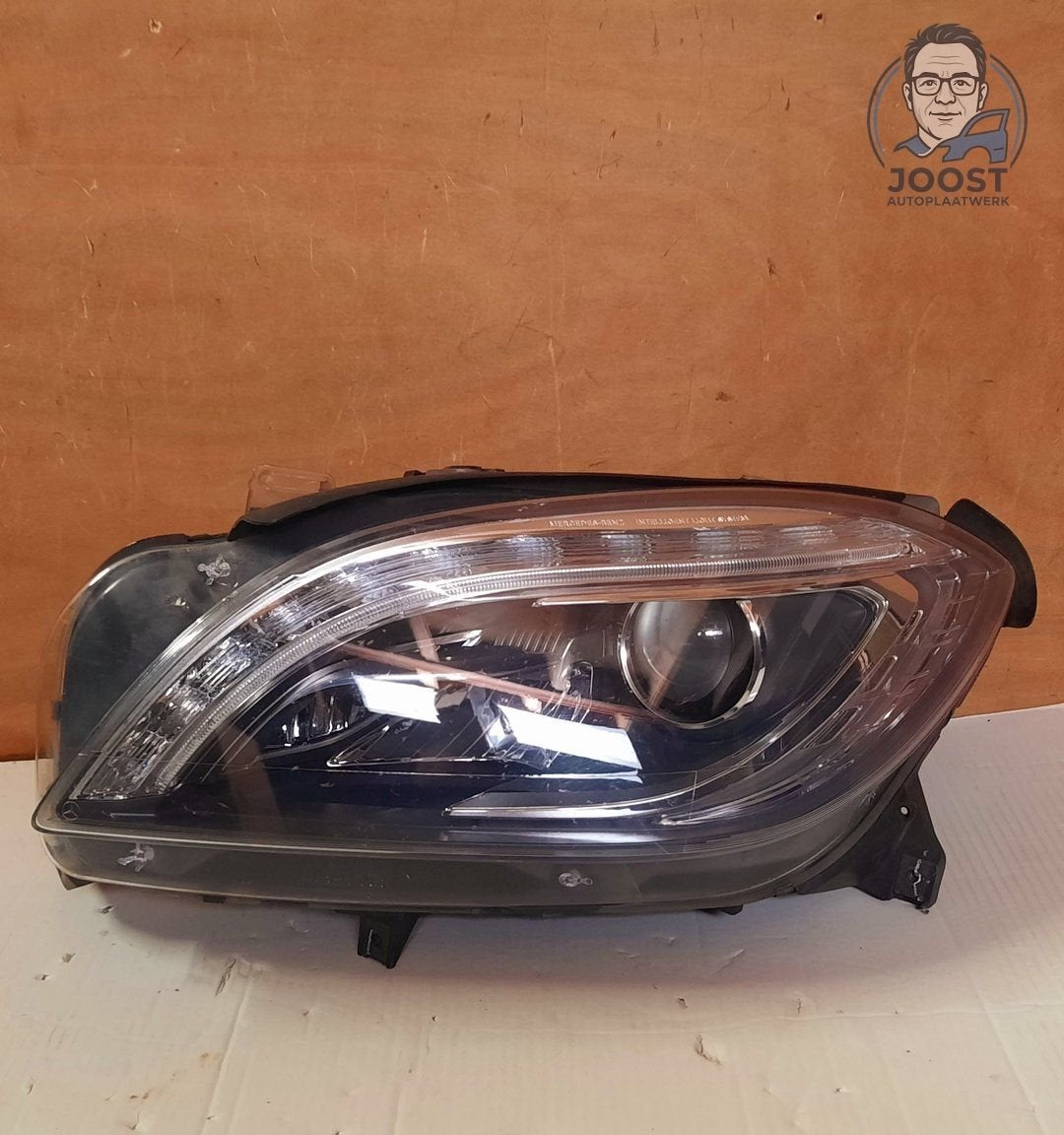 Koplamp links Bi-Xenon LED ILS Mercedes ML W166 A1668207259, Enlèvement ou Envoi, Origine de la pièce connue, Utilisé, -Mercedesstrasse 120, 70372 Stuutgart, Duitsland
