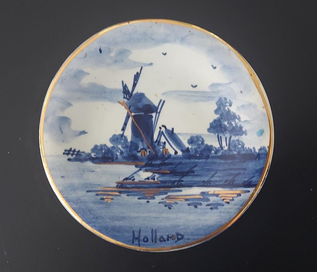 Petite assiette de Delft avec dorures, Enlèvement
