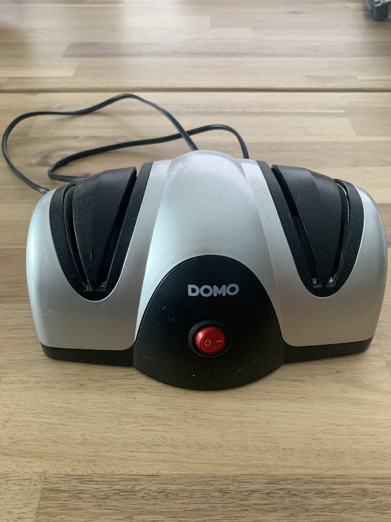 Elektrische messenslijper domo, Ophalen