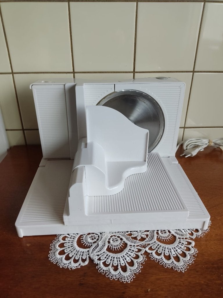 Broodbakmachine Domo, Ophalen