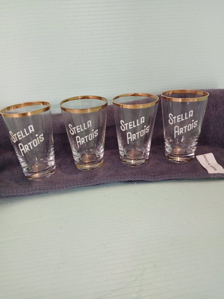 Quatre anciens petits verres de dégustation STELLA ARTOIS, Collections, Verres & Petits Verres, Enlèvement ou Envoi, Comme neuf