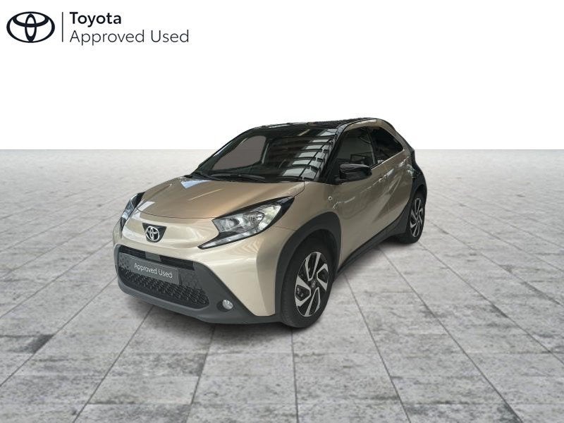 Toyota Aygo pulse+TECH PACK, Auto's, Toyota, Automaat, Euro 6, 72 pk, Beige