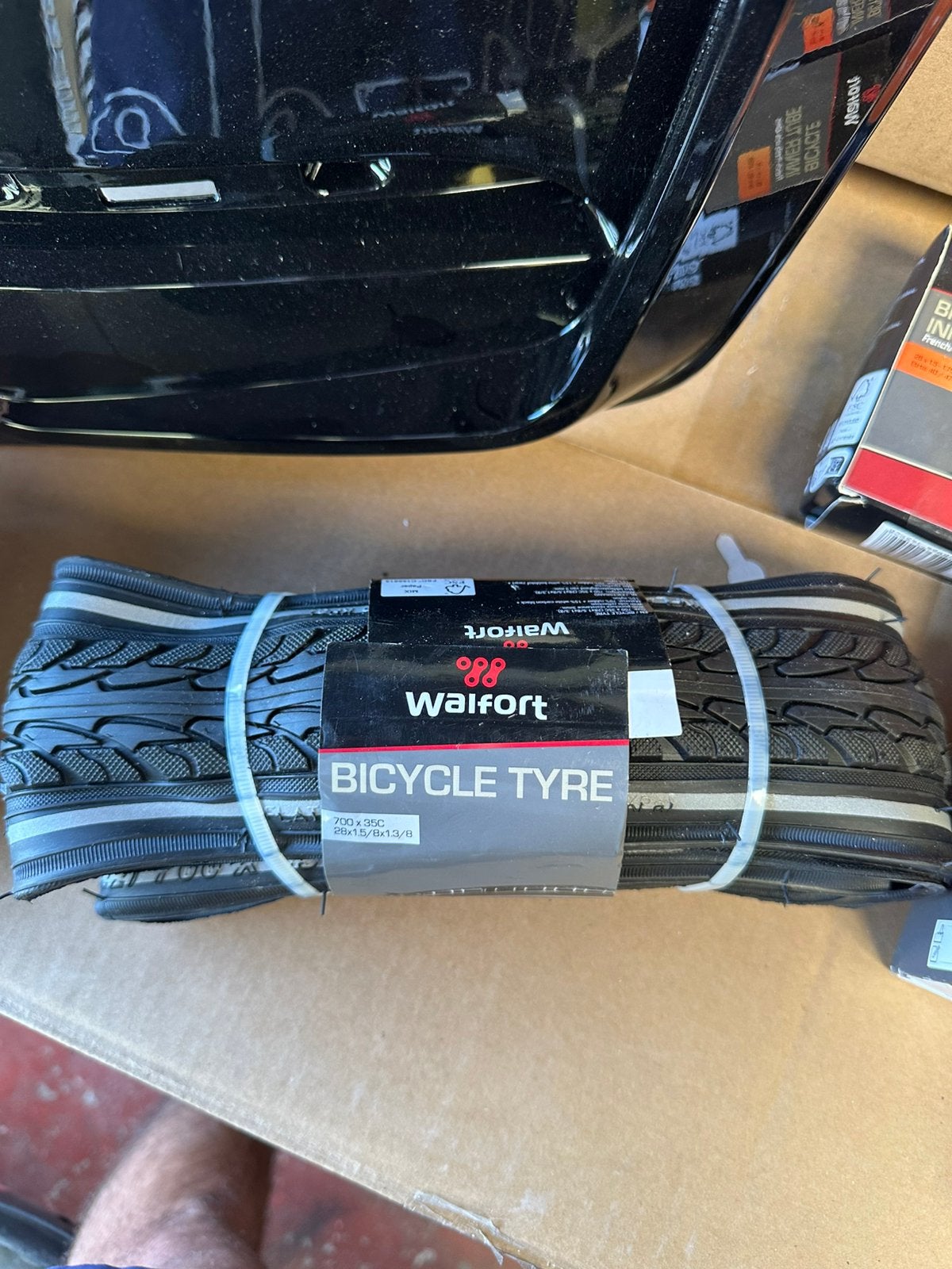 Nieuwe Walfort fietsband, Ophalen