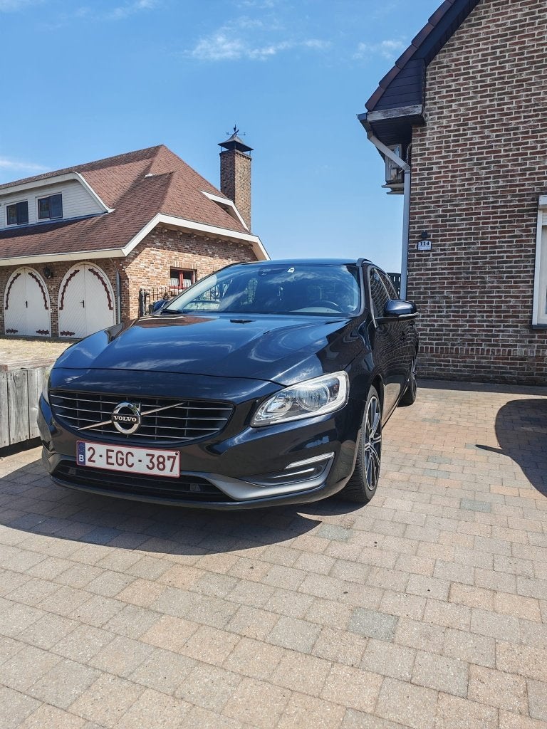 Volvo V60 1.6 | 2014 | 220.000 km | Volvo-onderhouden, Voorwielaandrijving, Euro 5, Stof, Zwart