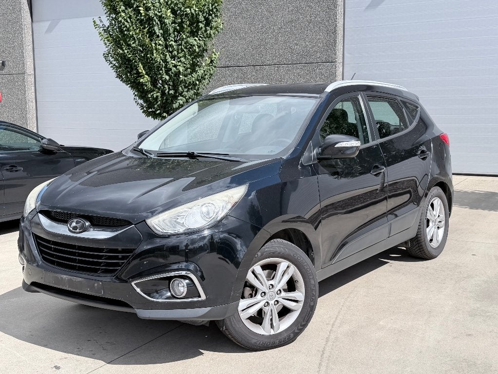 | Hyundai Ix35 | Trekhaak | Airco | 1.7 diesel |, Auto's, Hyundai, Voorwielaandrijving, Euro 5, Zwart, Leder en Stof