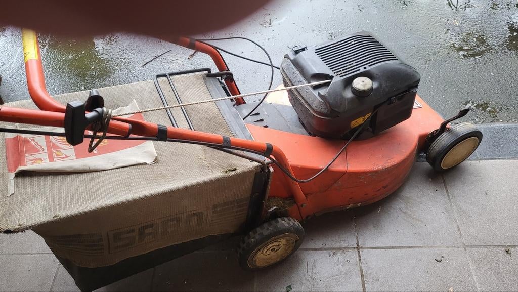 Grasmaaier  benzine, Ophalen