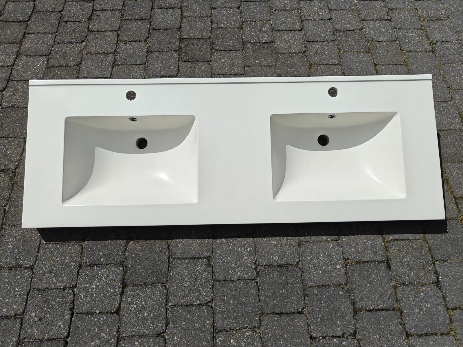 Dubbele wastafel, Ophalen