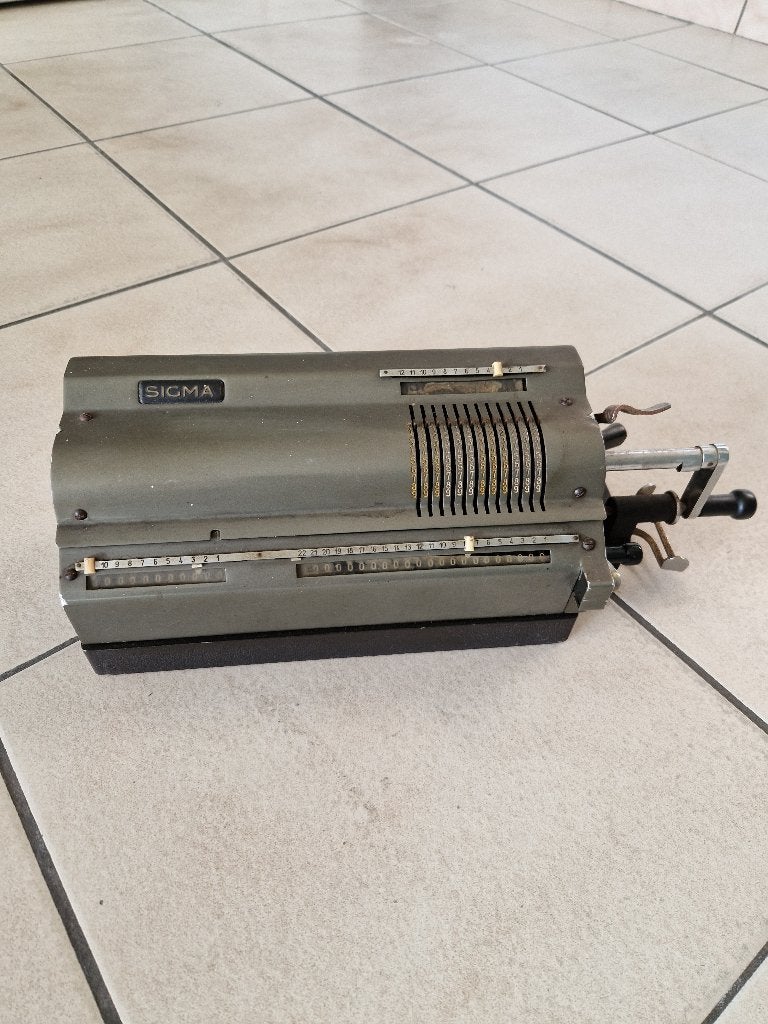 Ancienne machine de comptable, Ophalen