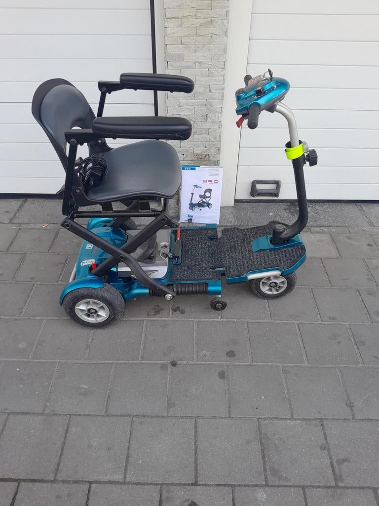 Chaise roulante électrique batterie à changer