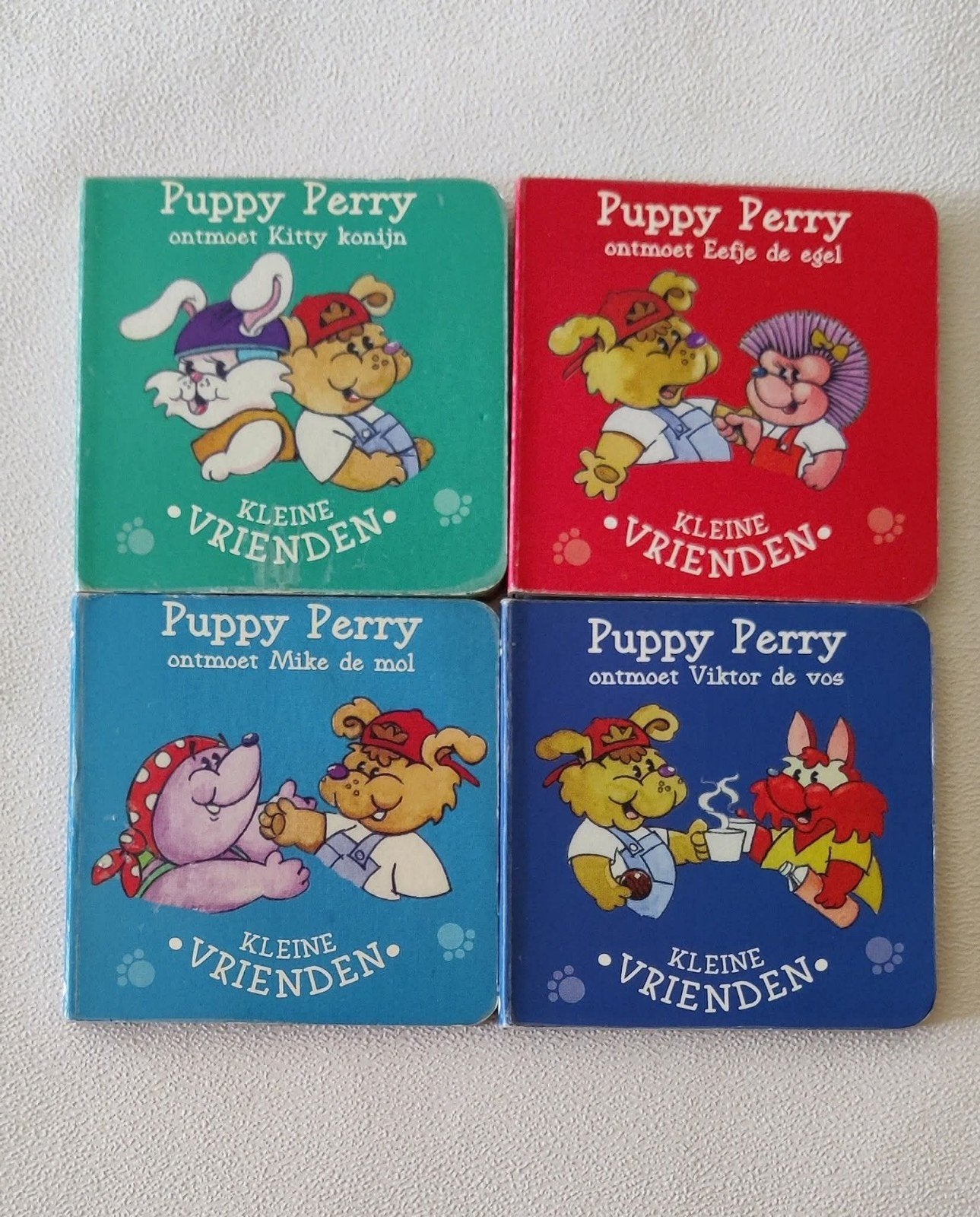 4 mini boekjes van Puppy en Perry, gebruikt maar nog mooi., Ophalen, Gelezen