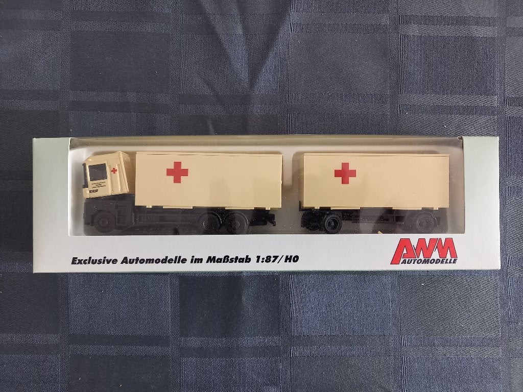 AWM 60215 vrachtwagen Renault AE Rode Kruis HO, Hobby en Vrije tijd, Ophalen of Verzenden, Zo goed als nieuw, Bus of Vrachtwagen