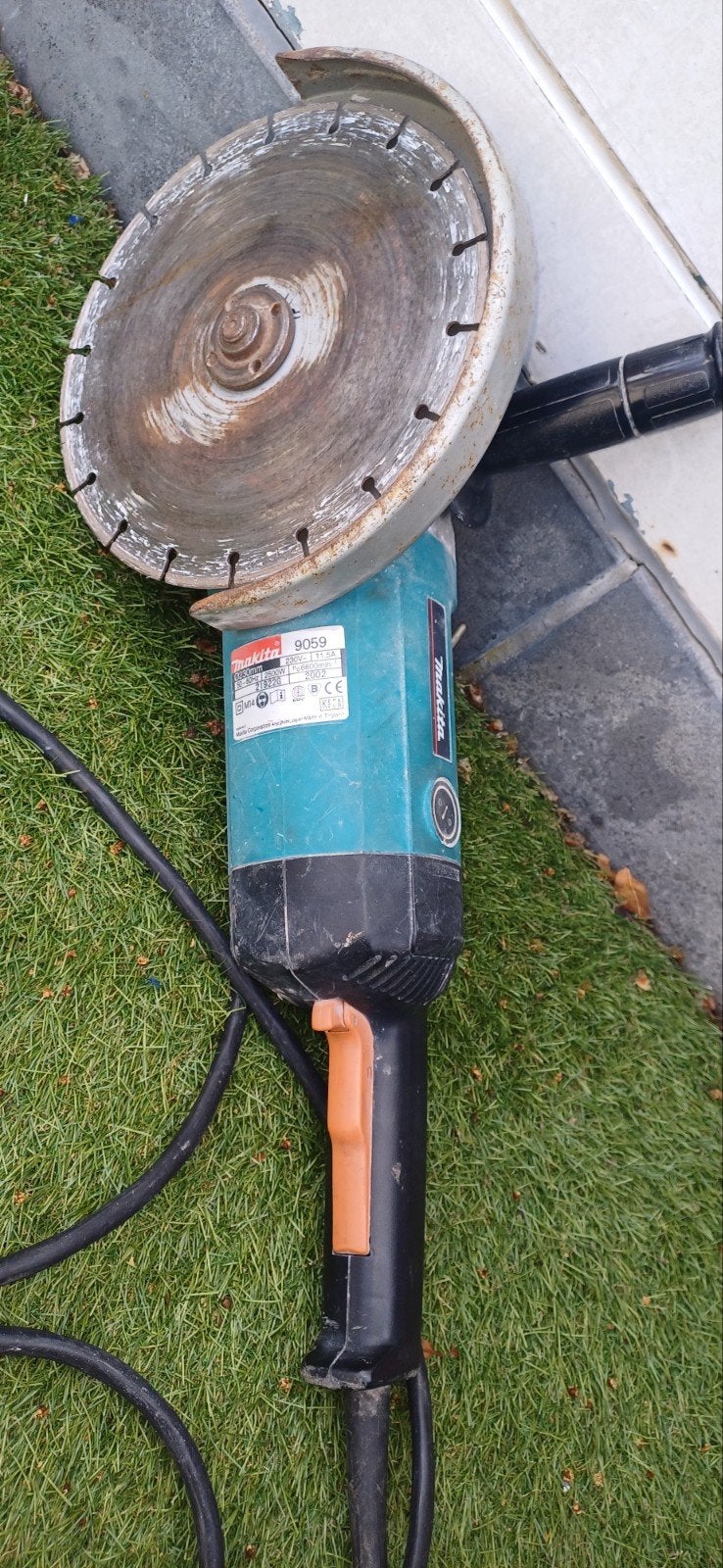 Makita slijpmachine, Enlèvement