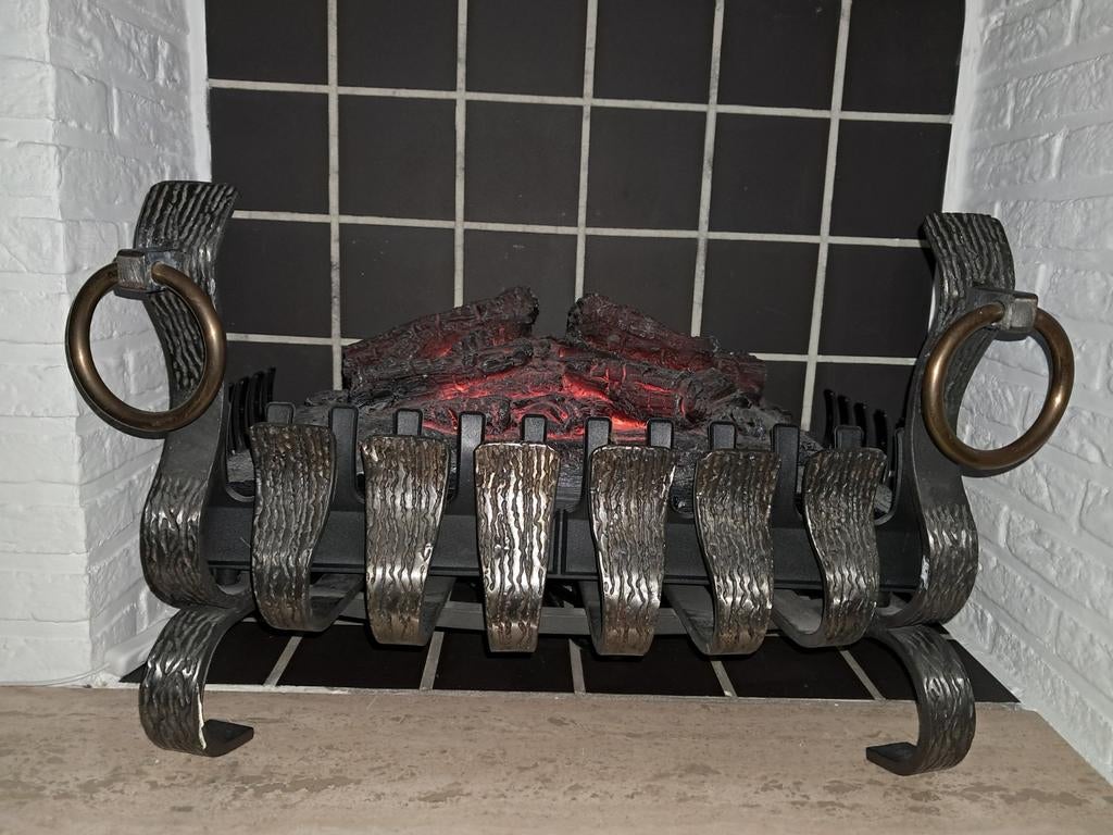 Smeedijzeren haardrooster, Ophalen