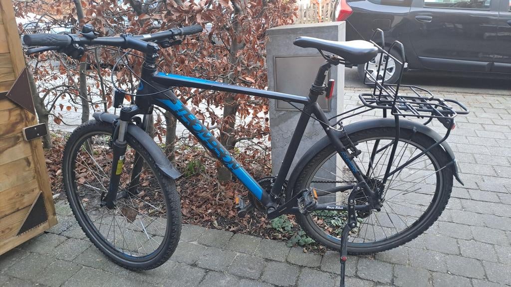 Jongensfiets met bagagedrager voor 10 tot 15 jarigen, Ophalen