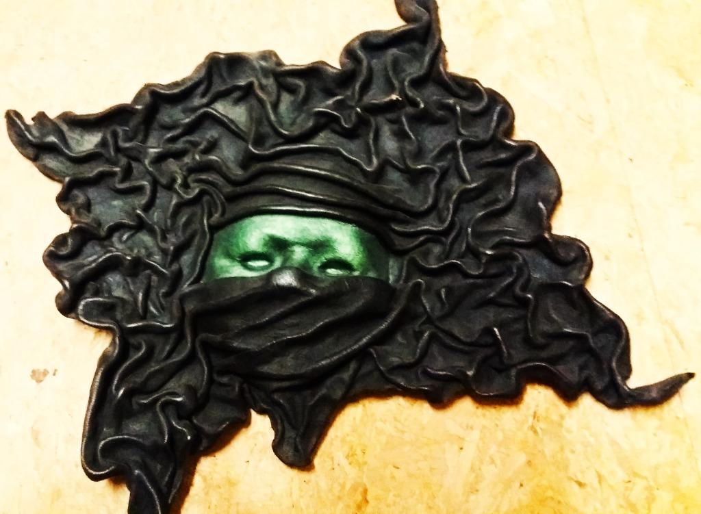 Décoration murale - Masque en cuir, Envoi