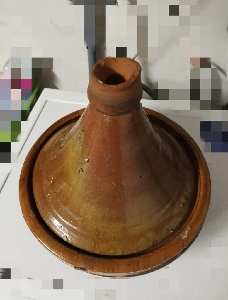 Tajine de cuisson en terre cuite, Enlèvement