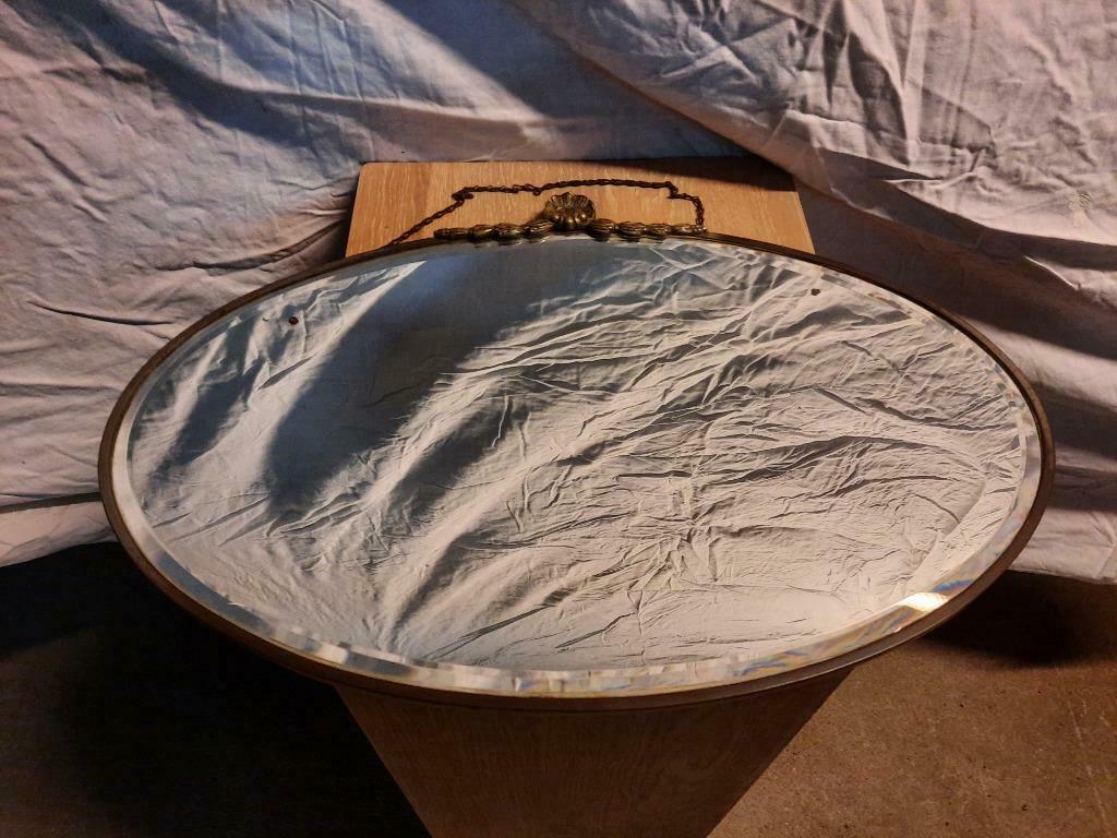 Antieke ovale spiegel. Met ketting om op te hangen, Ophalen of Verzenden, Ovaal, 50 tot 100 cm, Minder dan 100 cm