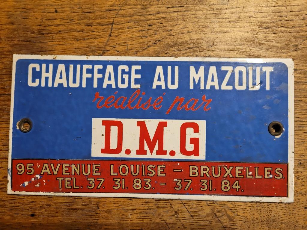 DMG maakt reclame voor geëmailleerde plaat met olieverwarmin, Ophalen of Verzenden, Gebruikt, Reclamebord