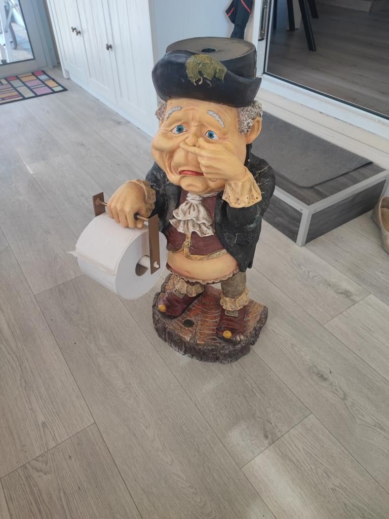 Laaf wc rol houder, Ophalen