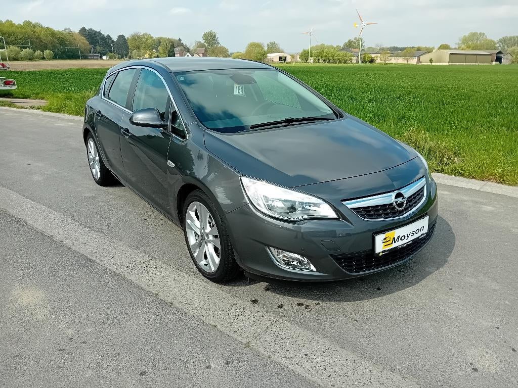 Opel Astra benzine met slechts 63000kms!! - 1 jr garantie, Auto's, Voorwielaandrijving, Euro 5, Stof, 4 cilinders