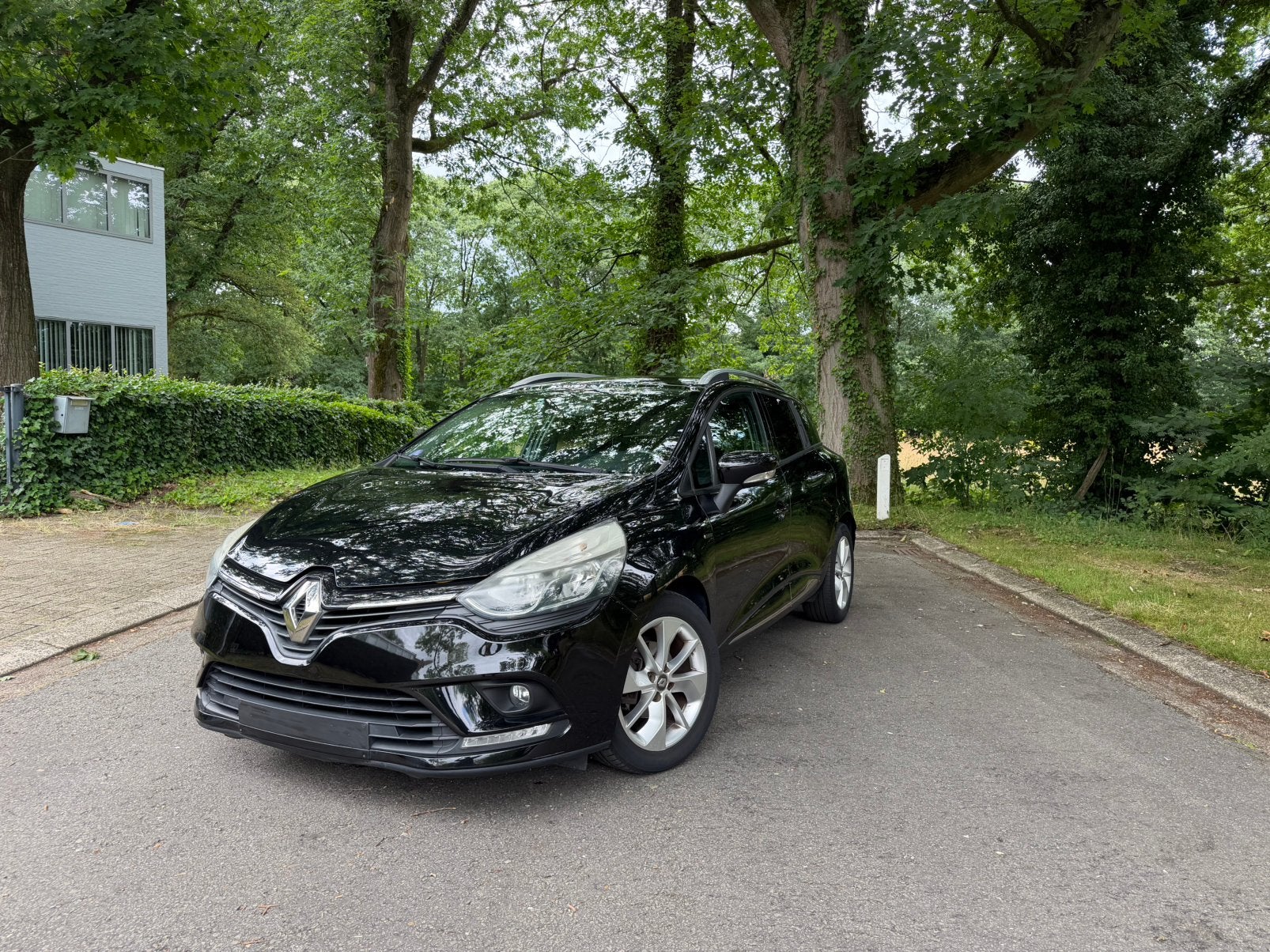 Renault Clio 1.2 Grandtour LIMITED, Auto's, Voorwielaandrijving, Stof, 4 cilinders, Zwart