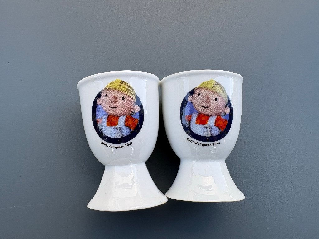 Set van 2 Vintage Bob de Bouwer Eierdopjes - Keramiek (2002), Huis en Inrichting, Keramiek, Overige typen, Vintage, Nieuw