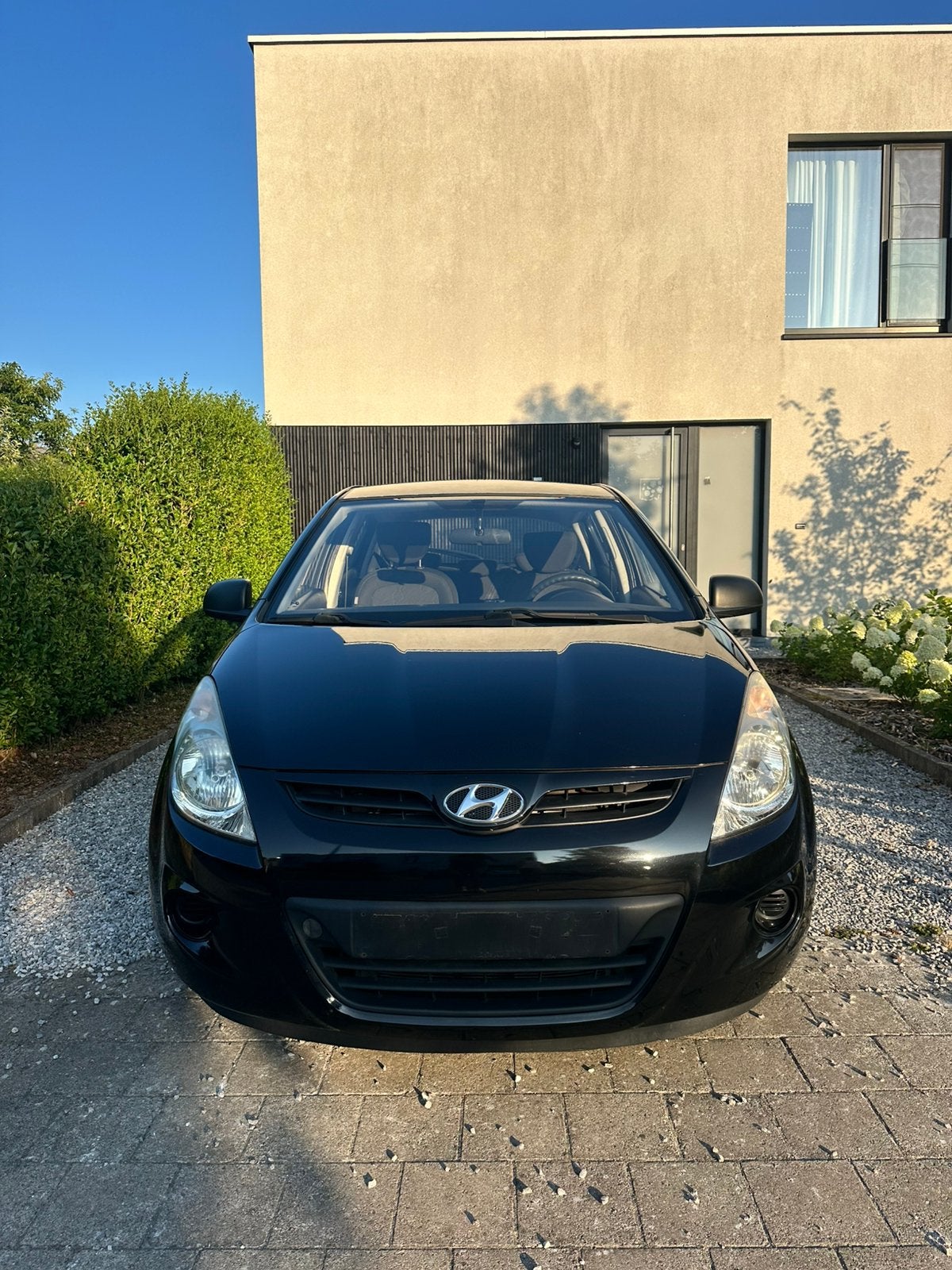 Hyundai I20 1.2 benzine zwart, Auto's, Hyundai, 57 kW, Euro 5, Stof, Automatische klimaatregeling