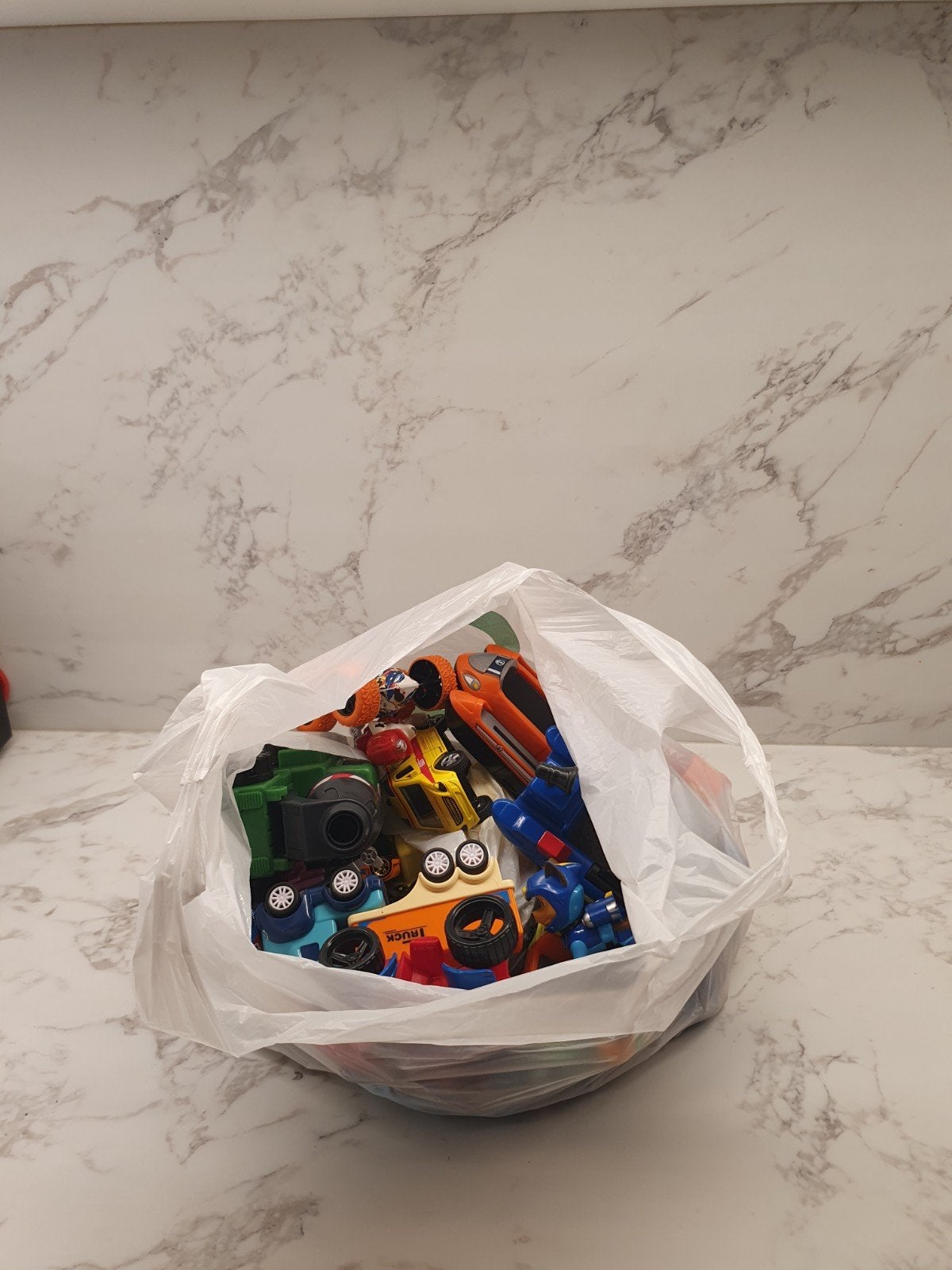Zakje vol vanalles (vooral auto's), Collections, Flippos, Enlèvement