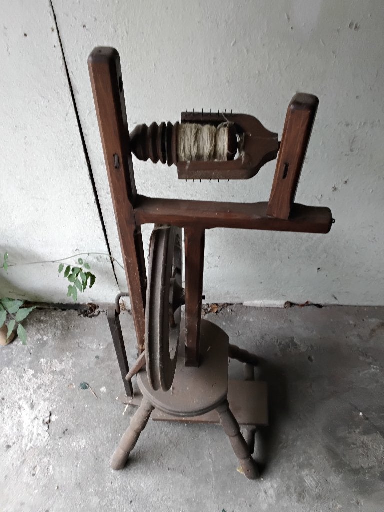 Spinnewiel antiek, Ophalen