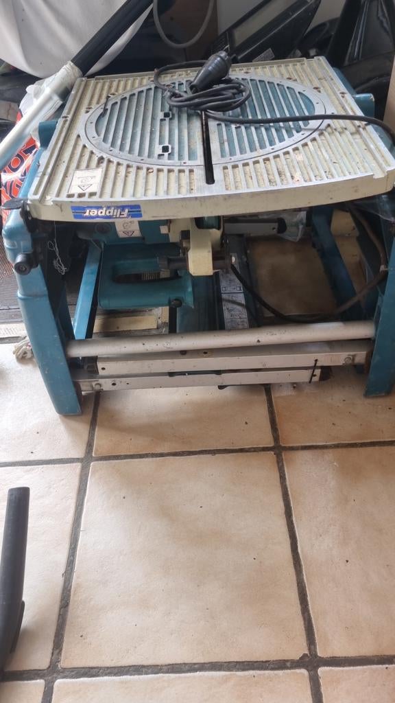Makita flipover zaag, Ophalen
