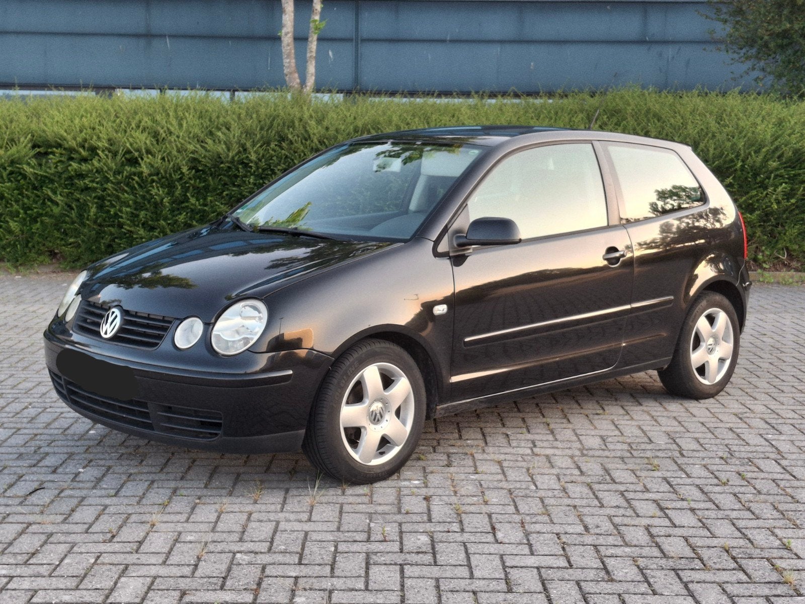 Volkswagen polo 1.2i Lage km, reeds gekeurd voor verkoop, Auto's, Voorwielaandrijving, Stof, Zwart, Bedrijf
