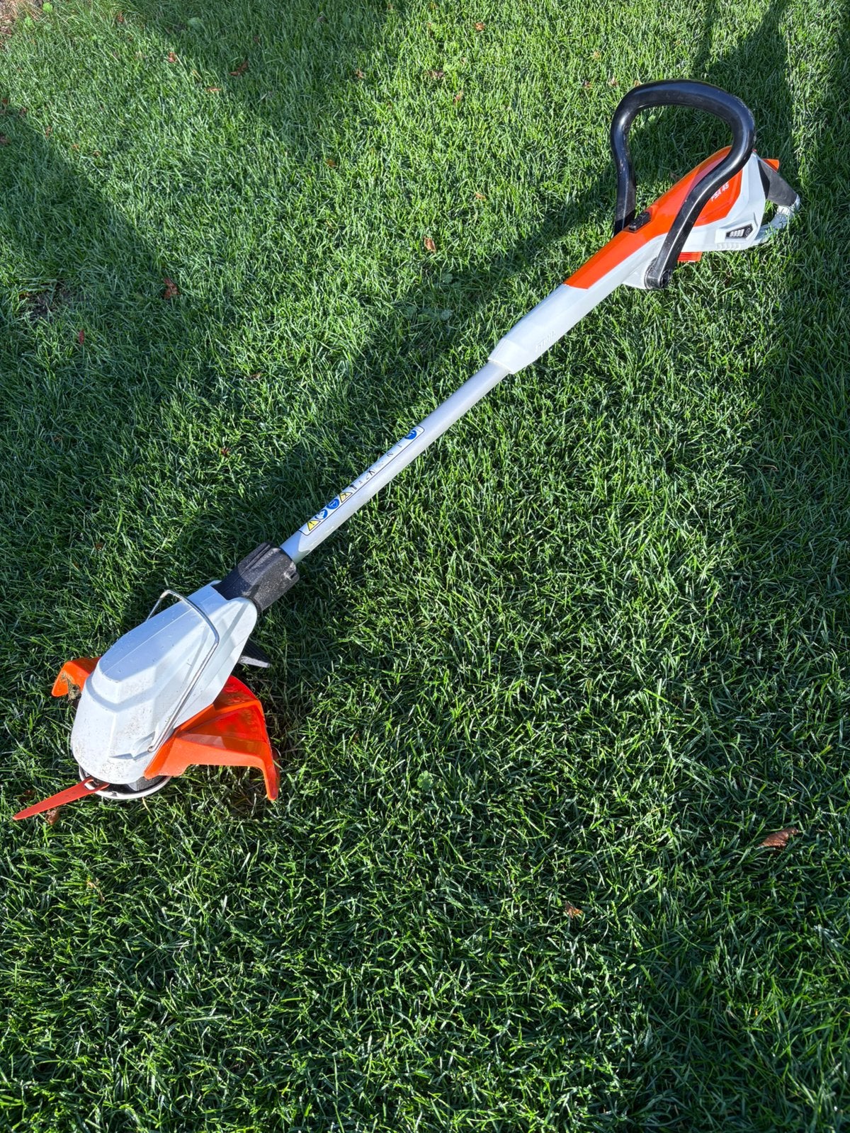 Stihl grastrimmer op batterij, Tuin en Terras, Ophalen, Zo goed als nieuw, Accu