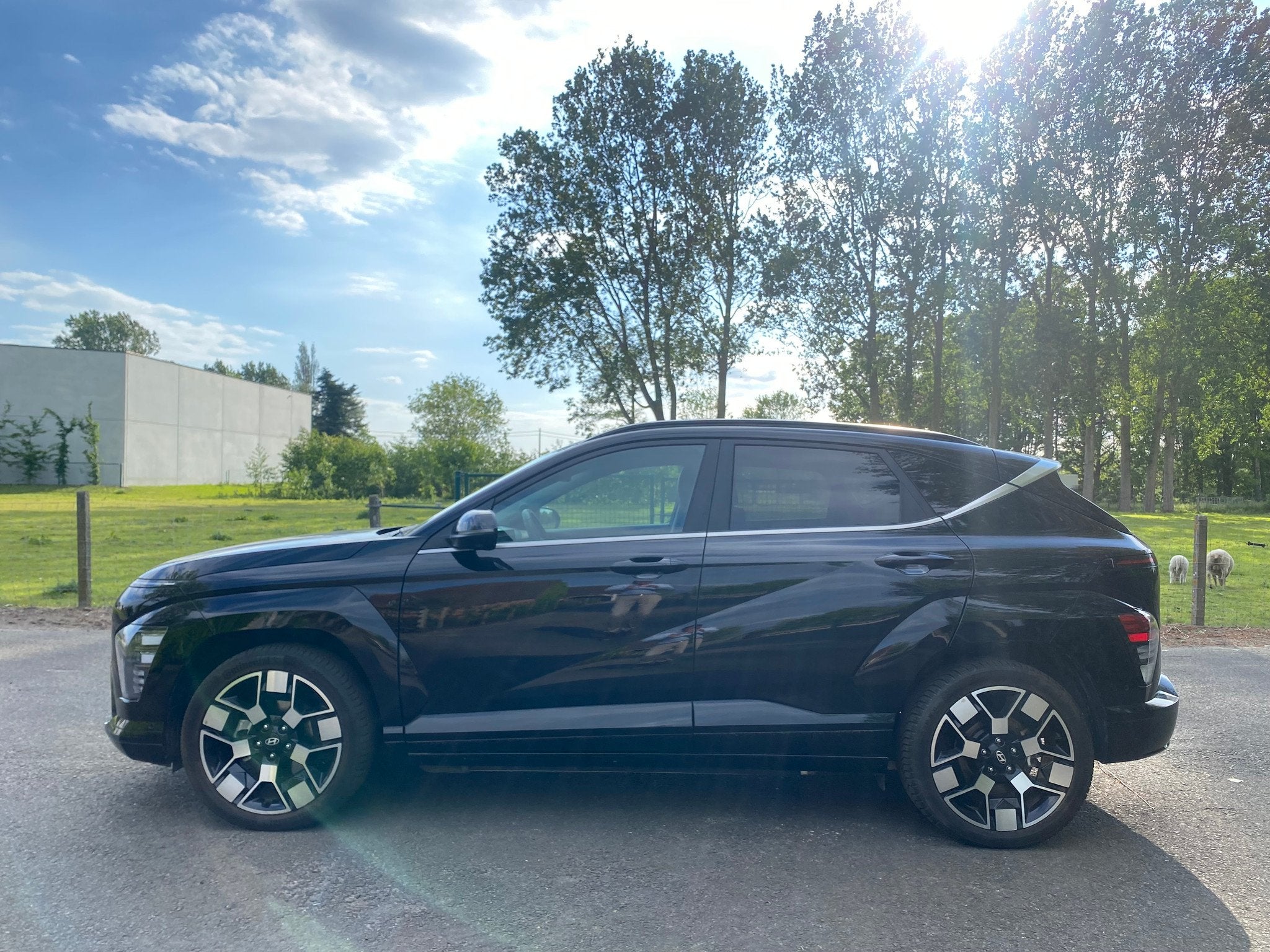 Hyundai KONA EV SHINE 65 kwh (bj 2024, automaat), Auto's, Gebruikt, Zwart, Zwart, Leder