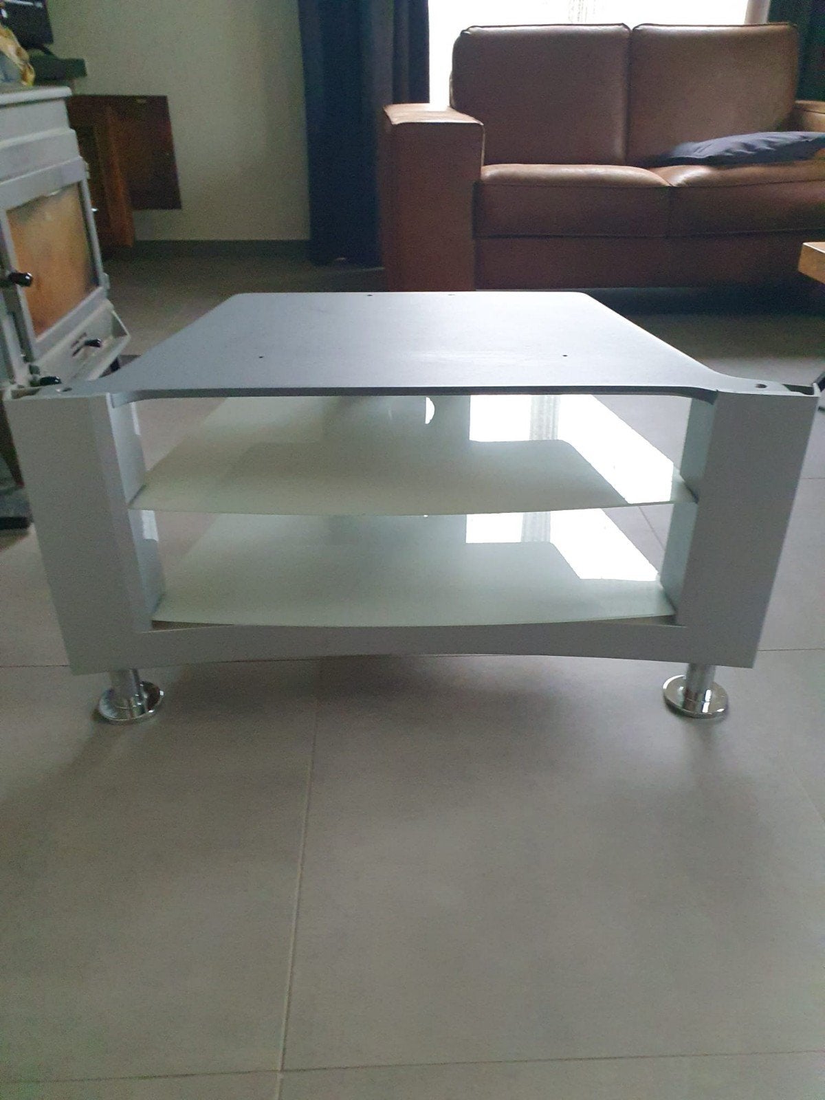Glazen salontafel, Ophalen