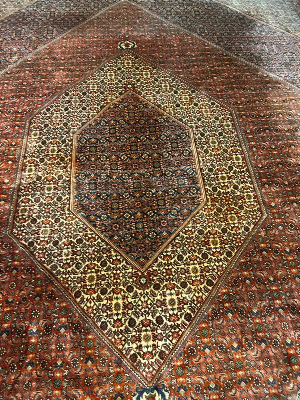 Iranse handgeknoopte tapijt, Ophalen