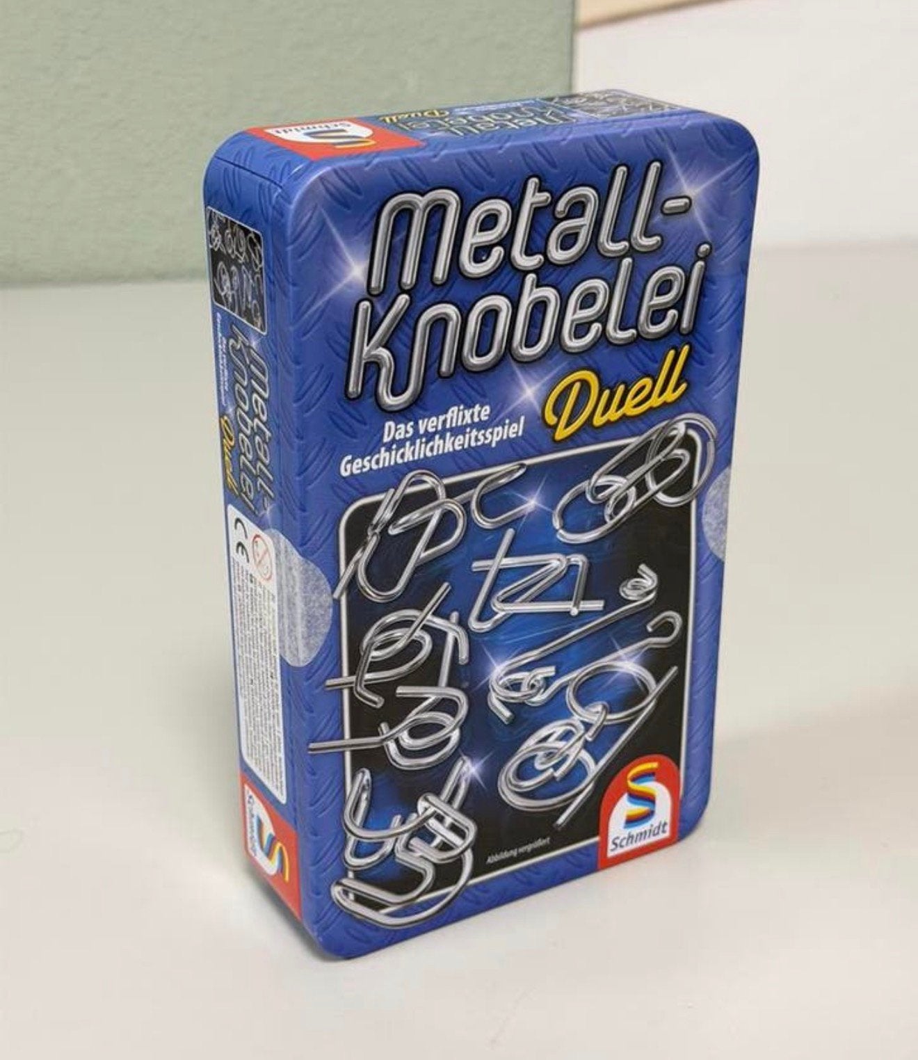 Schmidt Metall-Knobelei Duell Metalen knoop Puzzel Set, Hobby en Vrije tijd, Gezelschapsspellen | Overige, Vijf spelers of meer