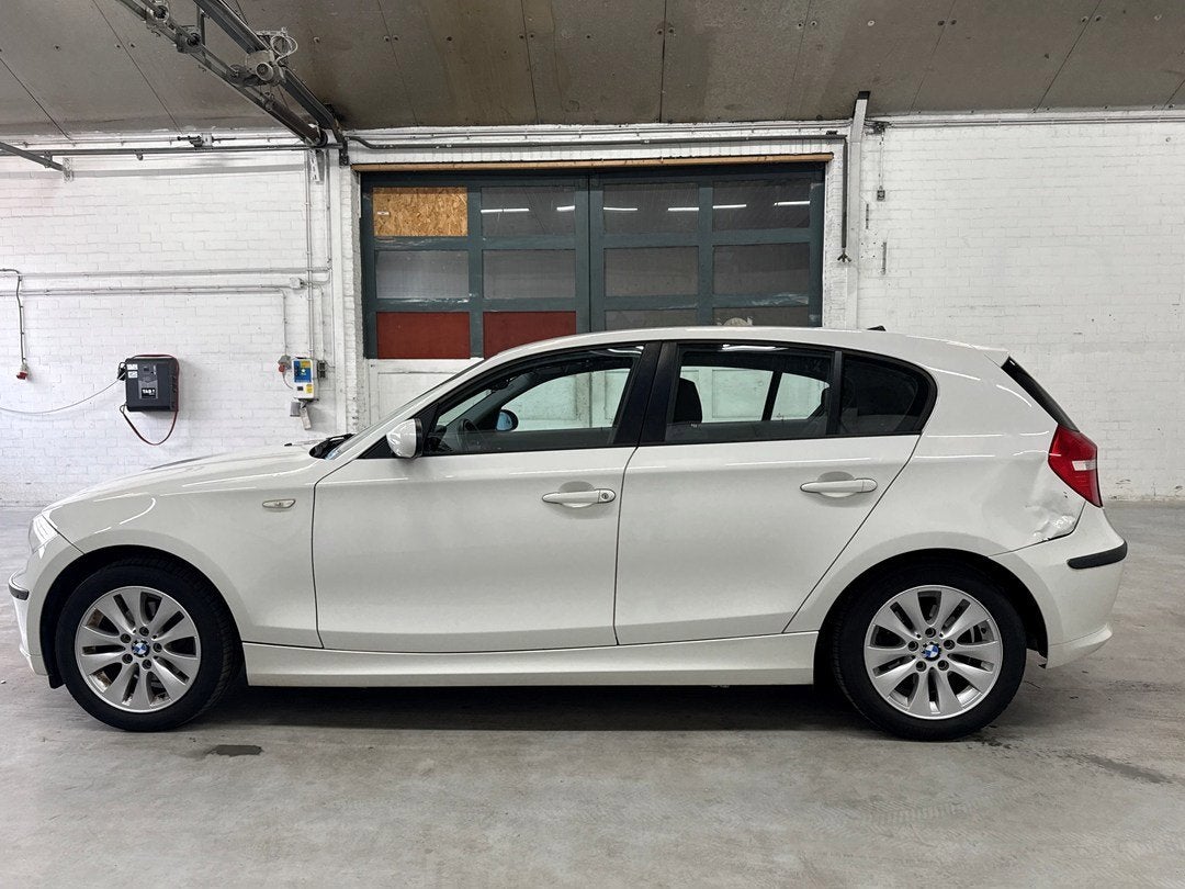 BMW 1-serie 116i Introduction | Airco | Schade, Autos, 139 g/km, Entreprise, Boîte manuelle, 5 portes