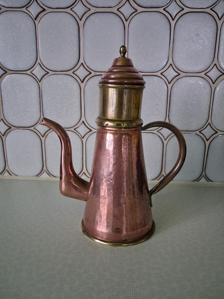 Antieke koperen koffiekan., Enlèvement