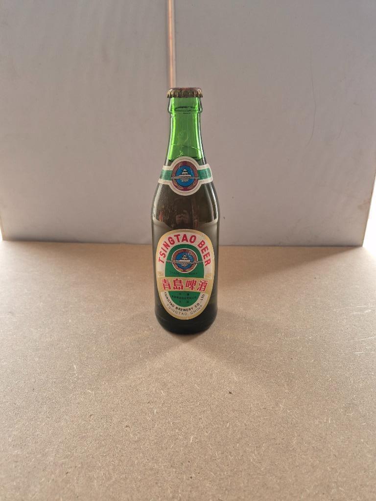 Bouteille de bière Tsingtao Beer (modèle 2), Collections, Enlèvement ou Envoi, Utilisé, Bouteille(s), Autres marques