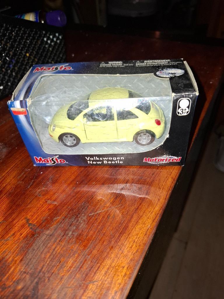Maisto volkswgen New Beetle, Hobby en Vrije tijd, Ophalen of Verzenden, Zo goed als nieuw, Auto, Maisto
