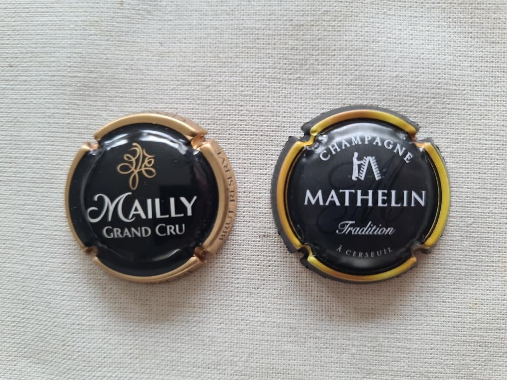 Champagnecapsules (2), Ophalen of Verzenden, Zo goed als nieuw