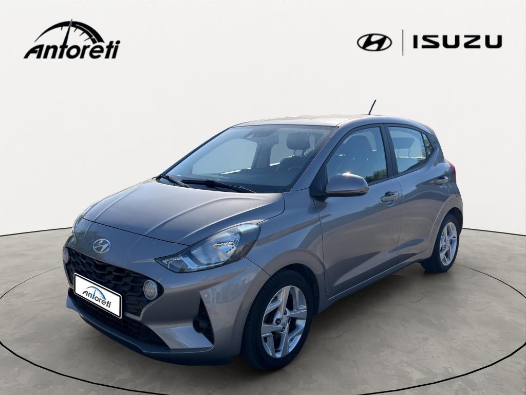 Hyundai i10 1.0i Twist Techno Pack, Auto's, Stof, https://public.car-pass.be/vhr/39bd675b-cd76-40be-9a5e-8b7d53b60380, Beige, 5 zetels