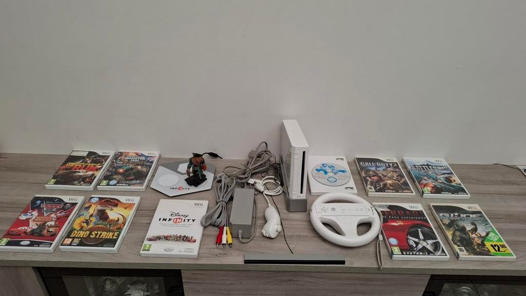 Nintendo Wii in goede staat met 10 games (Mario Kart,...), Games en Spelcomputers, Ophalen of Verzenden