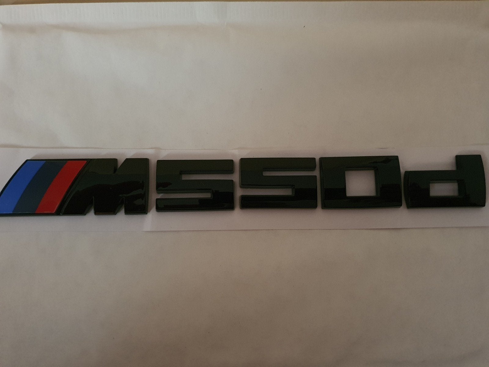 Bmw koffer logo m550d in het  blinkend zwart, Ophalen of Verzenden