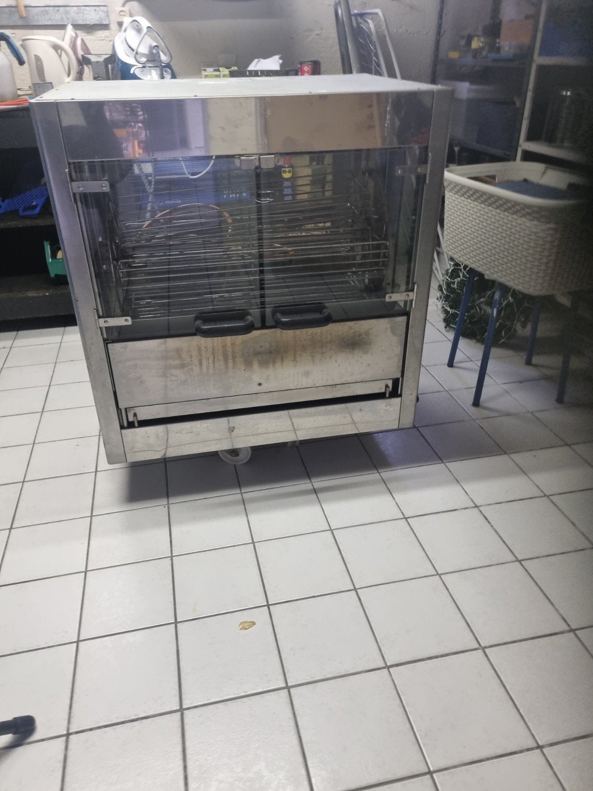 kippenbraadmachine, Ophalen