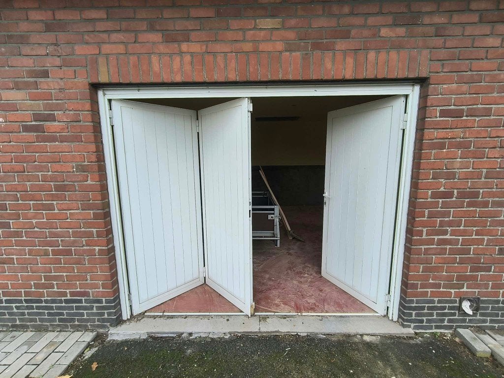 Garagepoort met aparte deur, Ophalen, Gebruikt, 120 cm of meer, Garagedeur