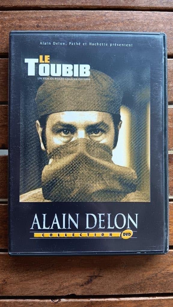 )))  Le Toubib  //  Alain Delon  (((, CD & DVD, Enlèvement ou Envoi, Tous les âges, Français, Comme neuf