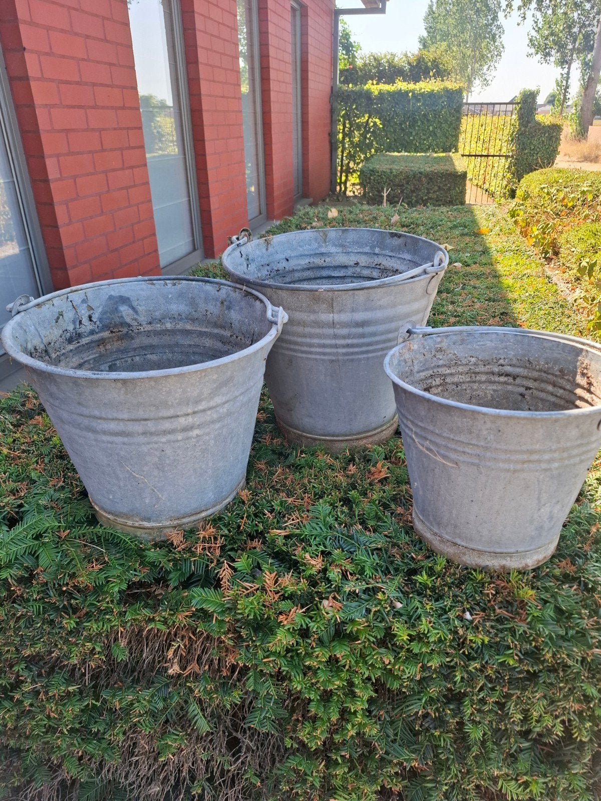 metalen emmers, Ophalen