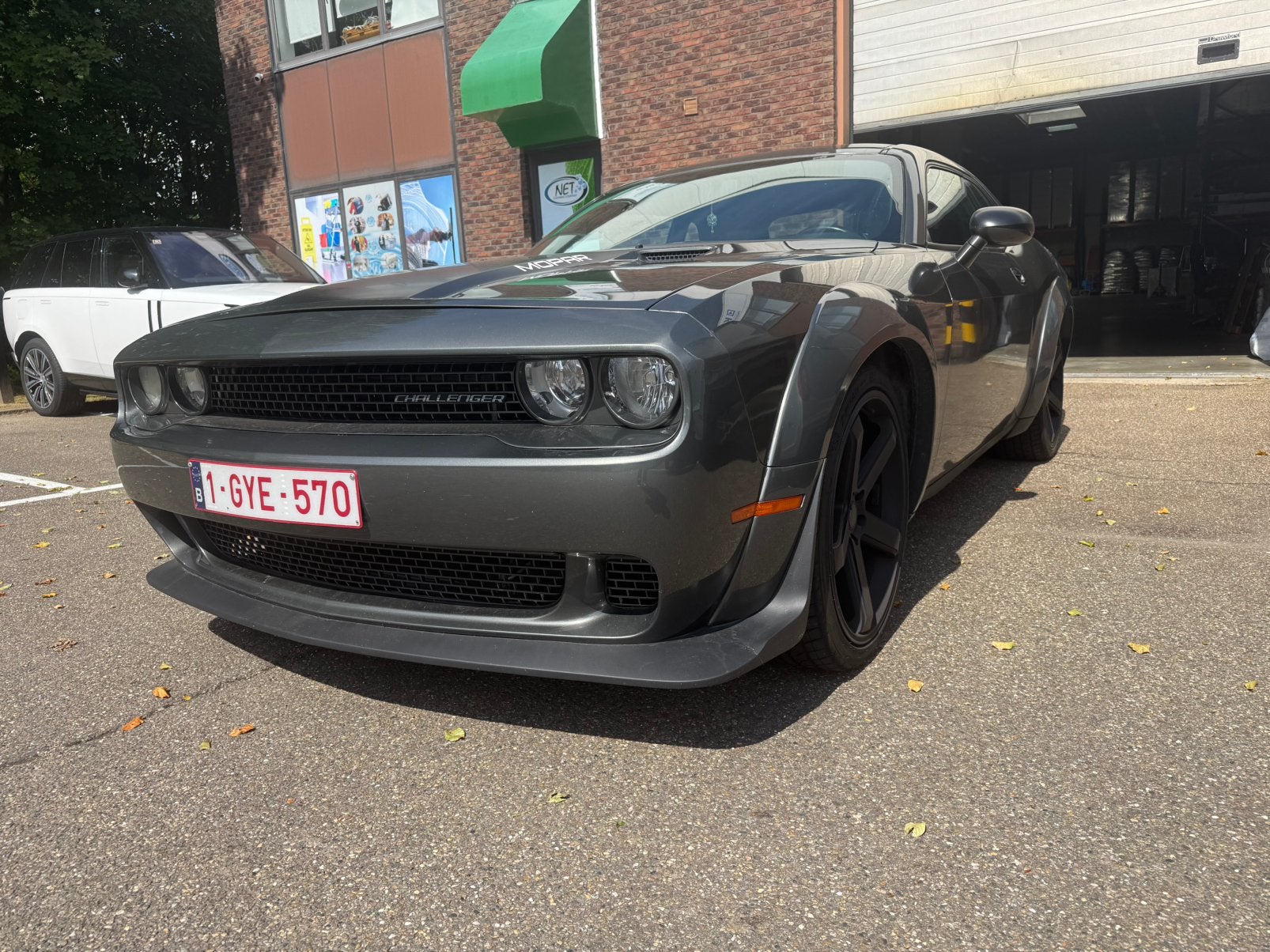Dodge Challenger 3.5 V6 2009 Demon-kit! Goed onderhouden!, Auto's, Automaat, Zwart, 3500 cc, Bruin